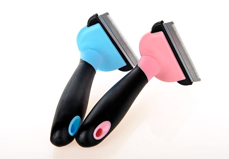 Undercoat rake grooming brush removing loose pet hair and reducing shedding