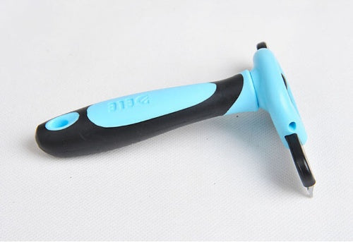 Undercoat rake grooming brush removing loose pet hair and reducing shedding